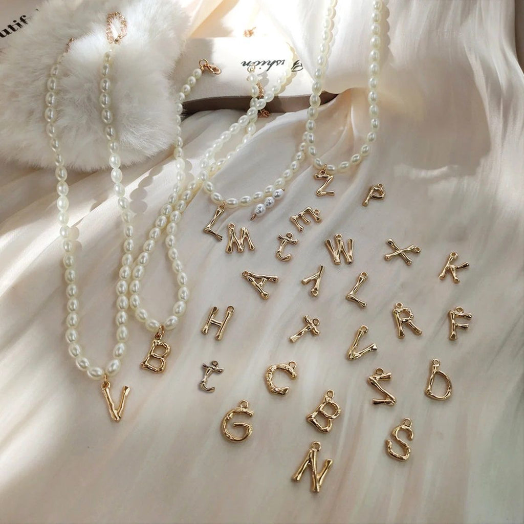 French retro-style pearl necklace with elegant alphabet design