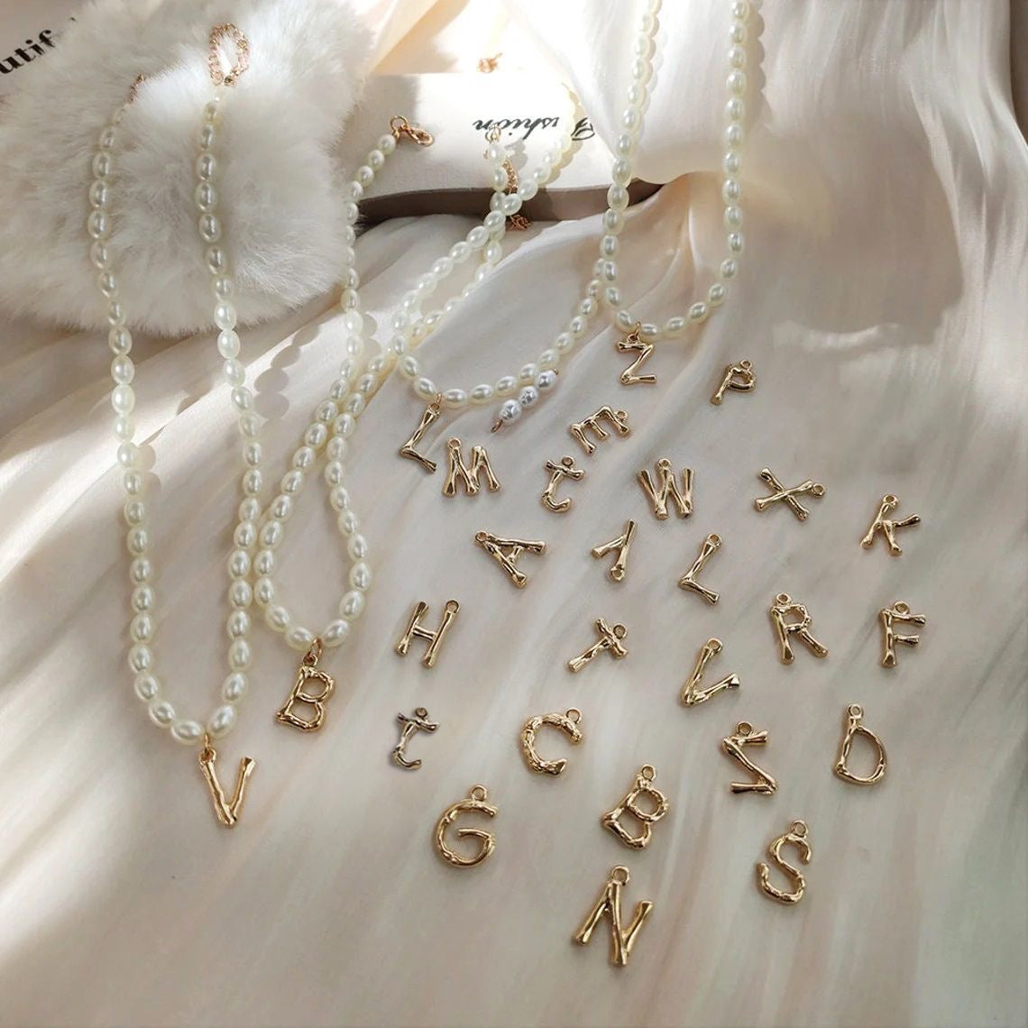 French retro-style pearl necklace with elegant alphabet design